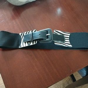 Wide Accent belt with buckle and zebra print.